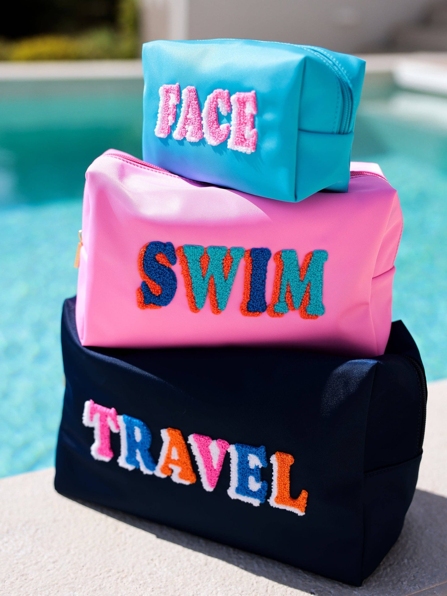 "FACE" SMALL ZIP POUCH, AZURE