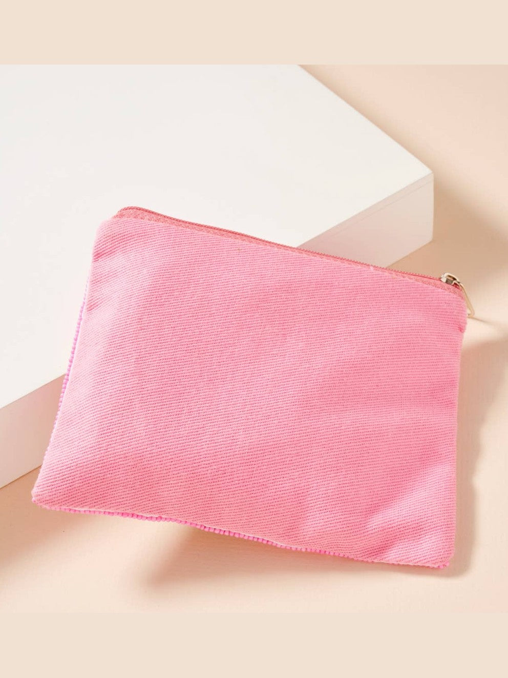 Pink fabric coin pouch with zipper closure