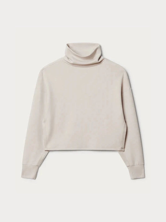 Flat lay of Sand DreamGlow Mock Neck sweatshirt showing relaxed fit and ribbed cuffs