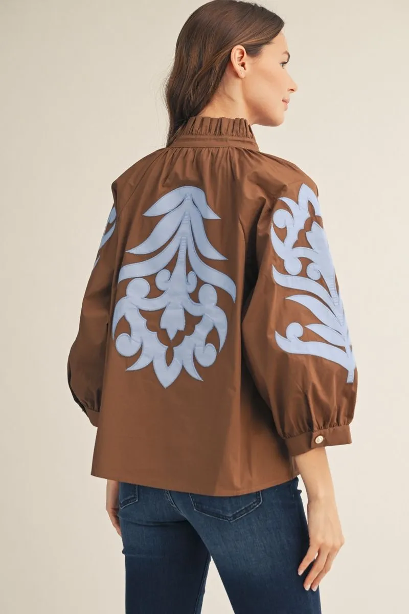 Brown Blouse with Blue Appliqué