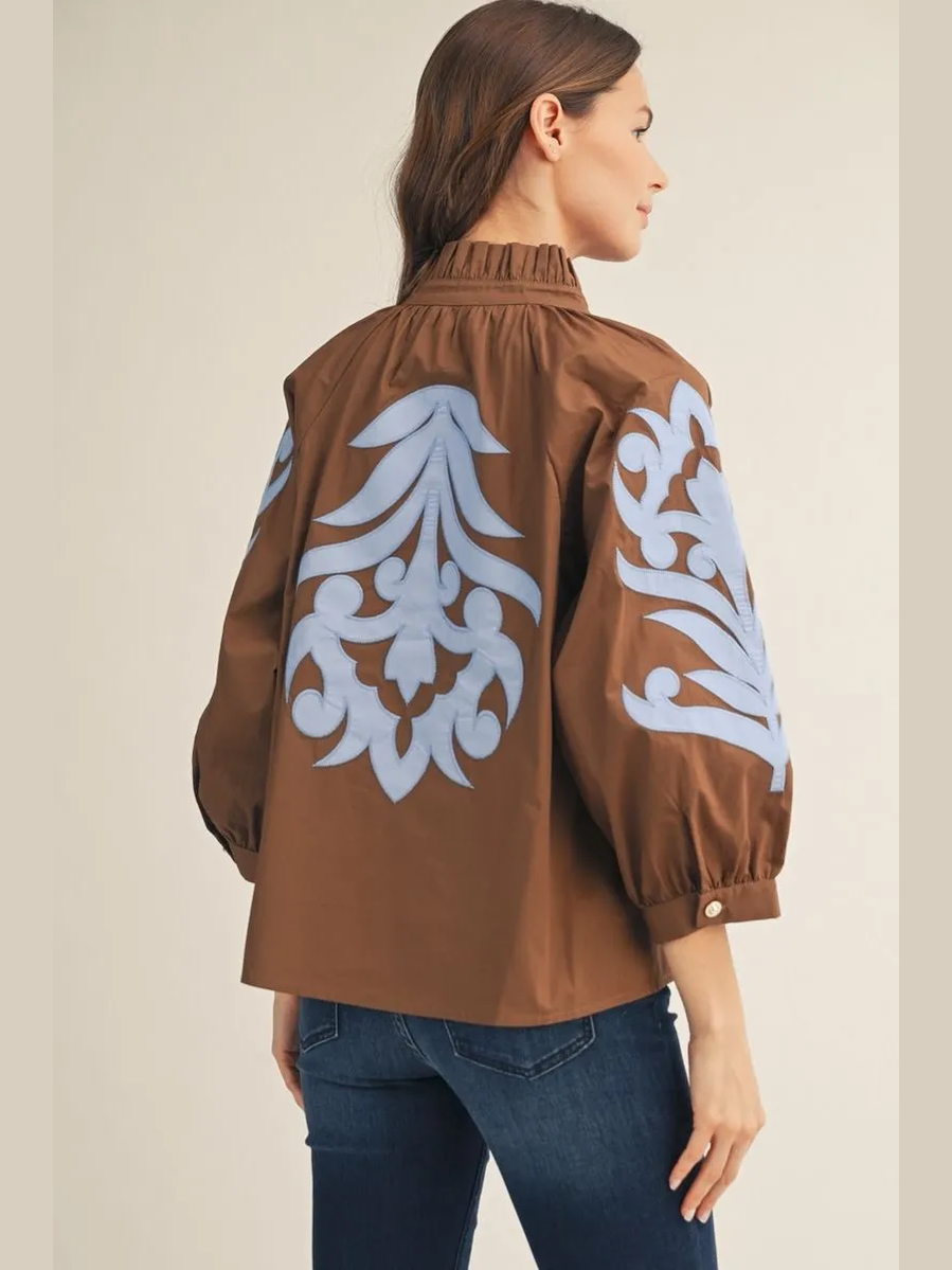 Brown Blouse with Blue Appliqué