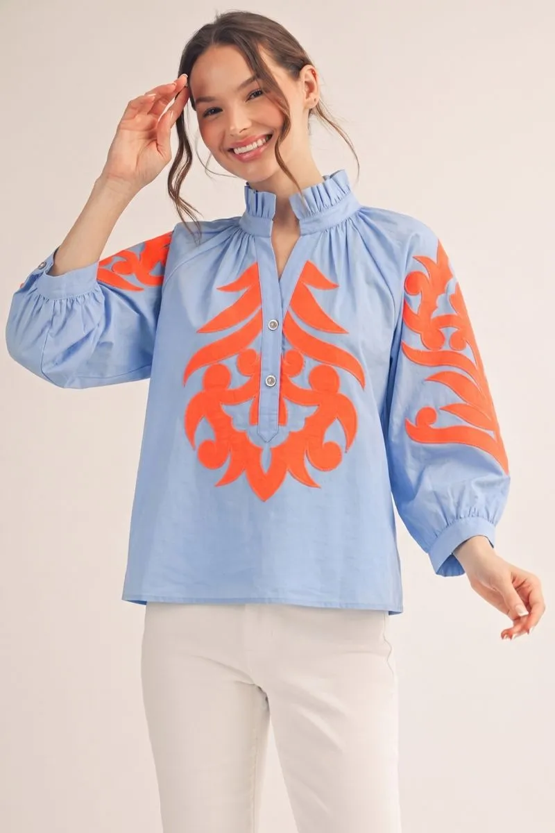 Light Blue Blouse with Orange Appliqué