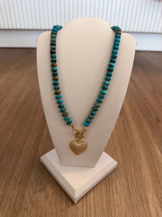 Turquoise and brown patterned bead necklace with gold heart
