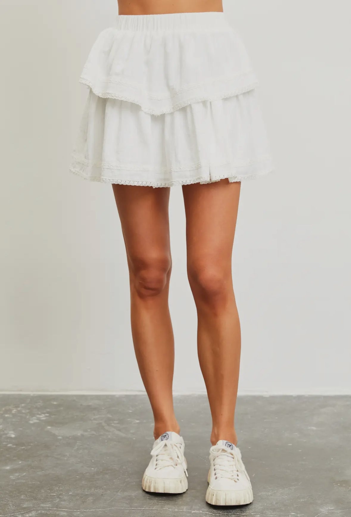 White ruffled skirt