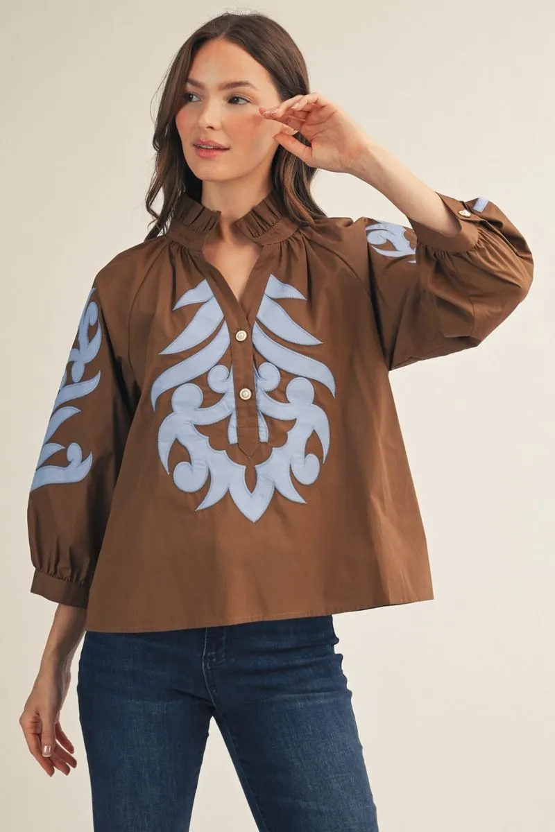 Brown Blouse with Blue Appliqué